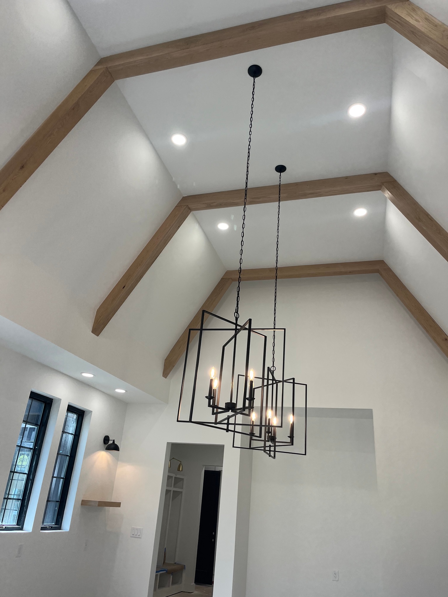 Custom chandelier and beam lighting install